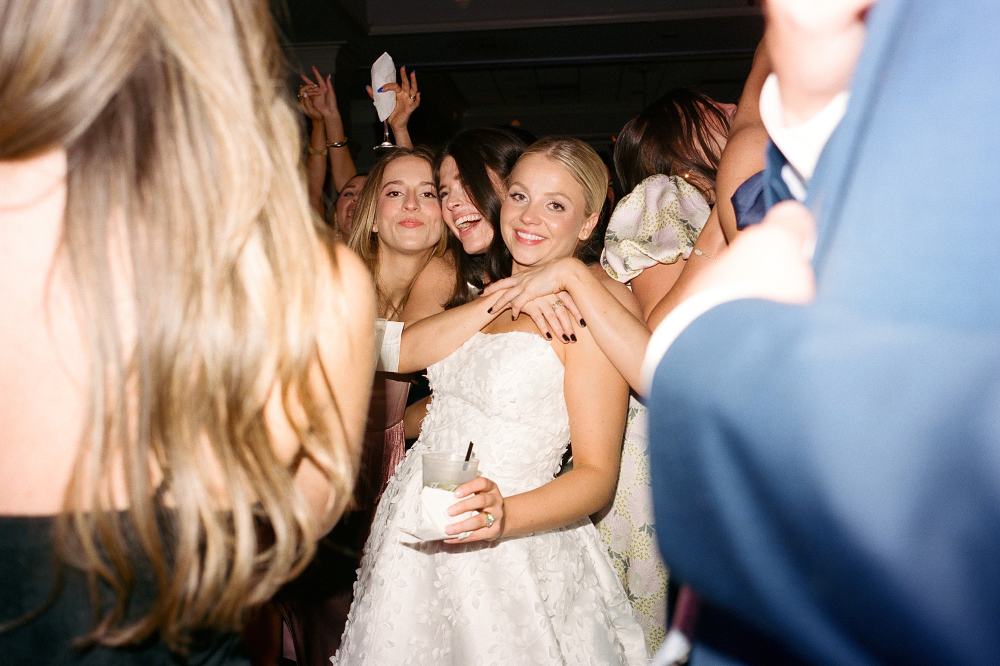 bride dances with guests during wedding reception in Lafayette LA