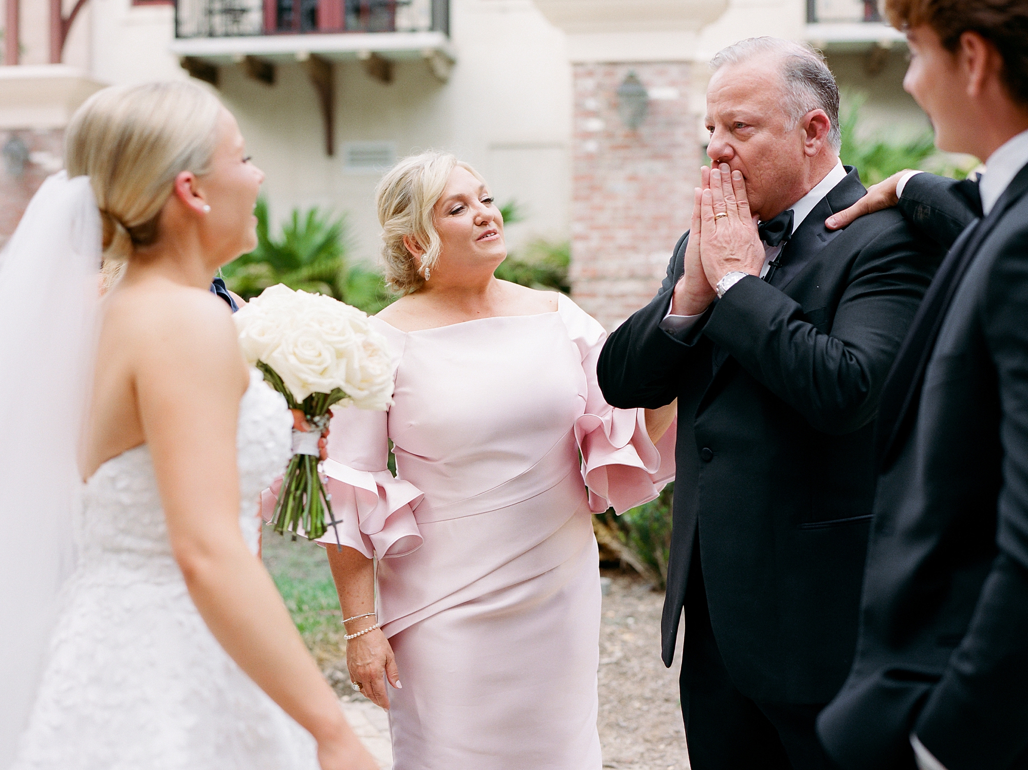 father of the bride cries during first look with daughter 