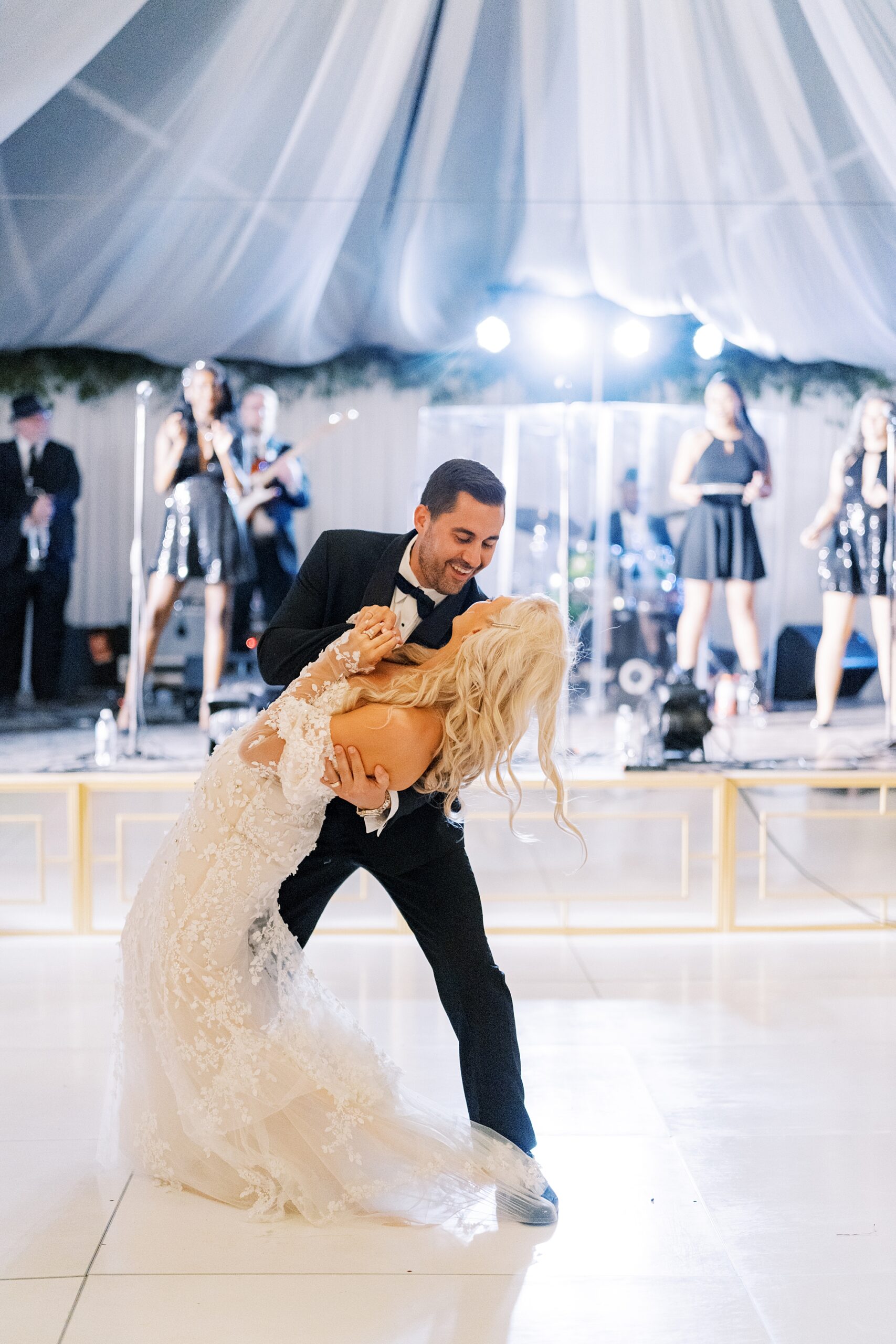 groom drips bride on dance floor at the University of Louisiana at Lafayette alumni center