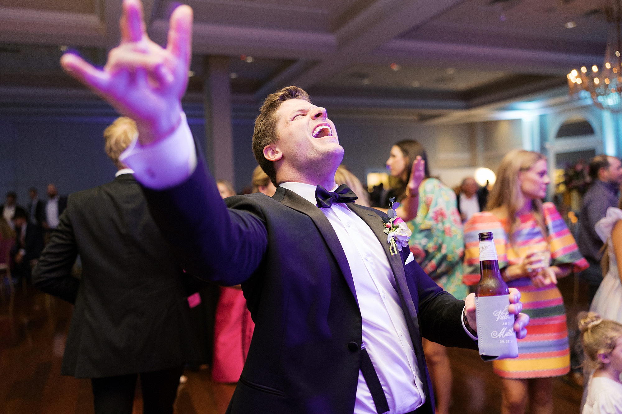 groom dances with guests at Le Pavilion Hotel
