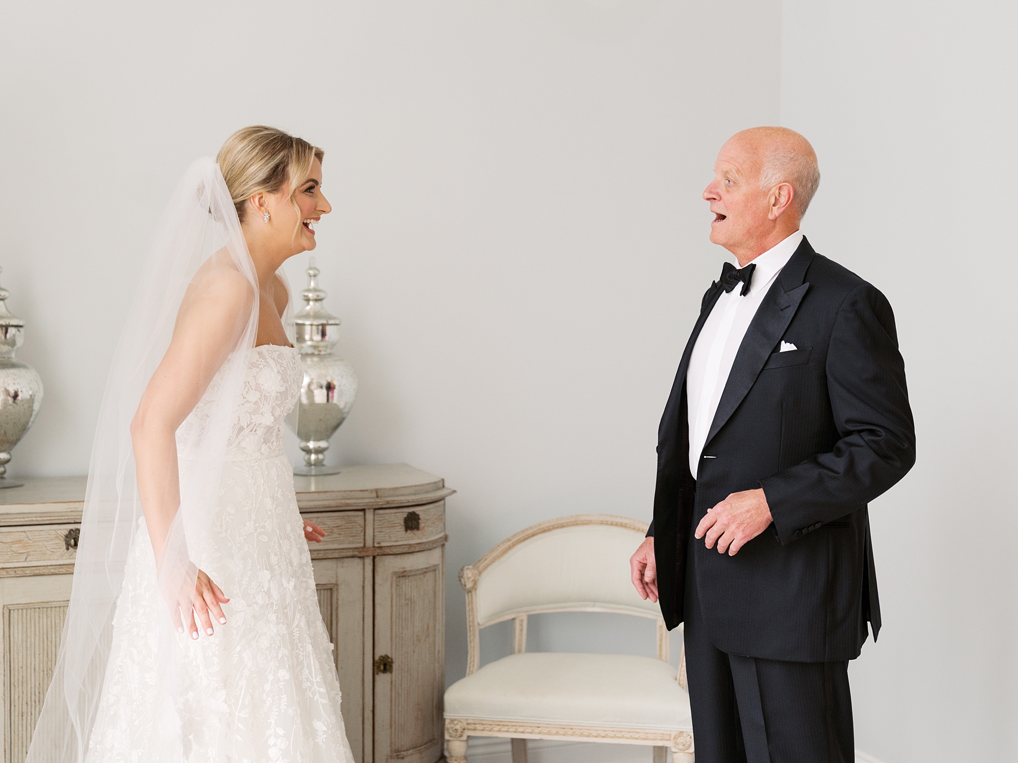 bride approaches dad for first look inside Le Pavilion Hotel