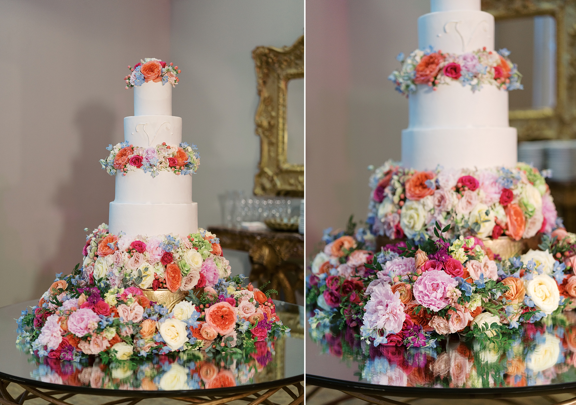 tiered wedding cake with pink flowers on side 
