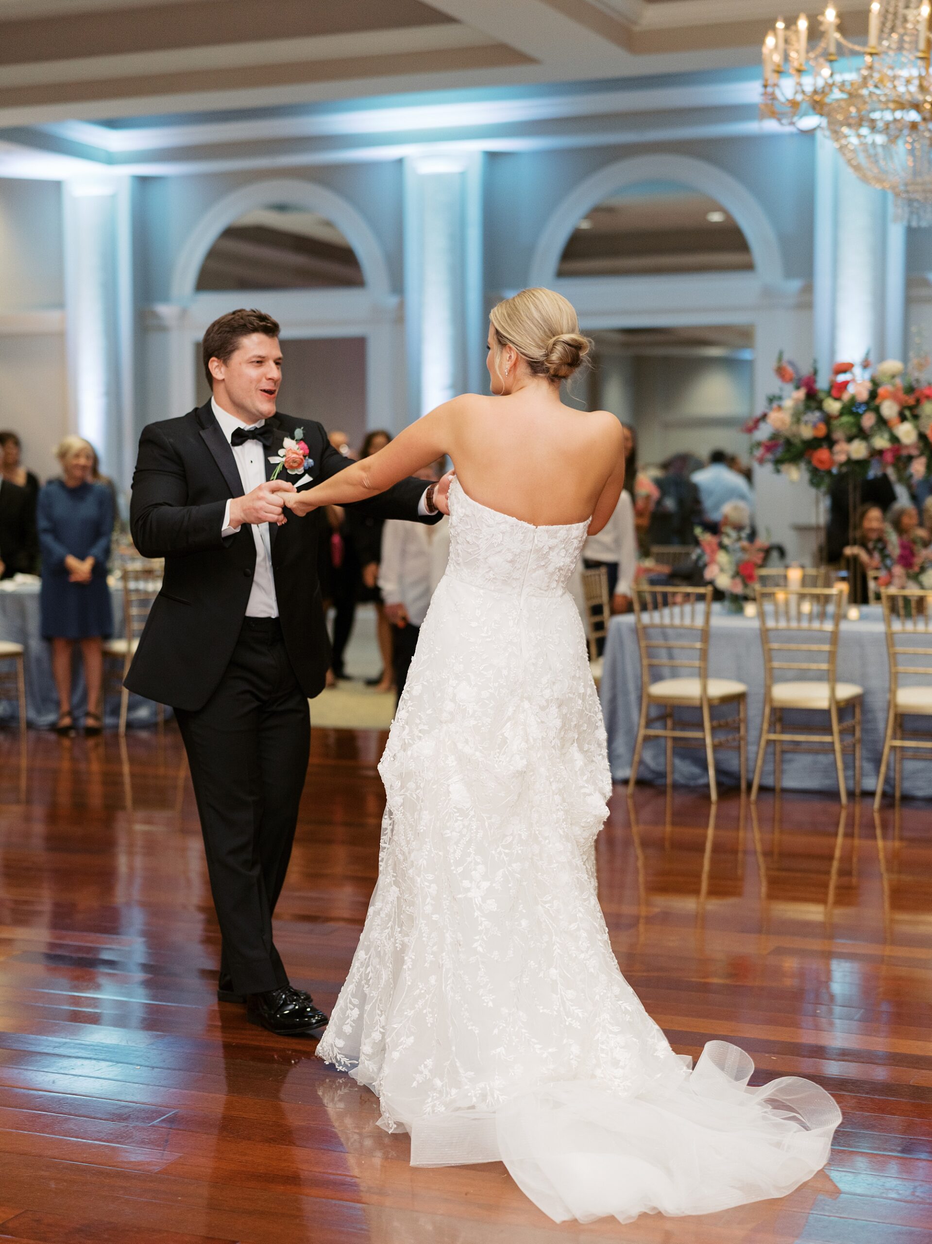 newlyweds dance during reception at Le Pavilion Hotel