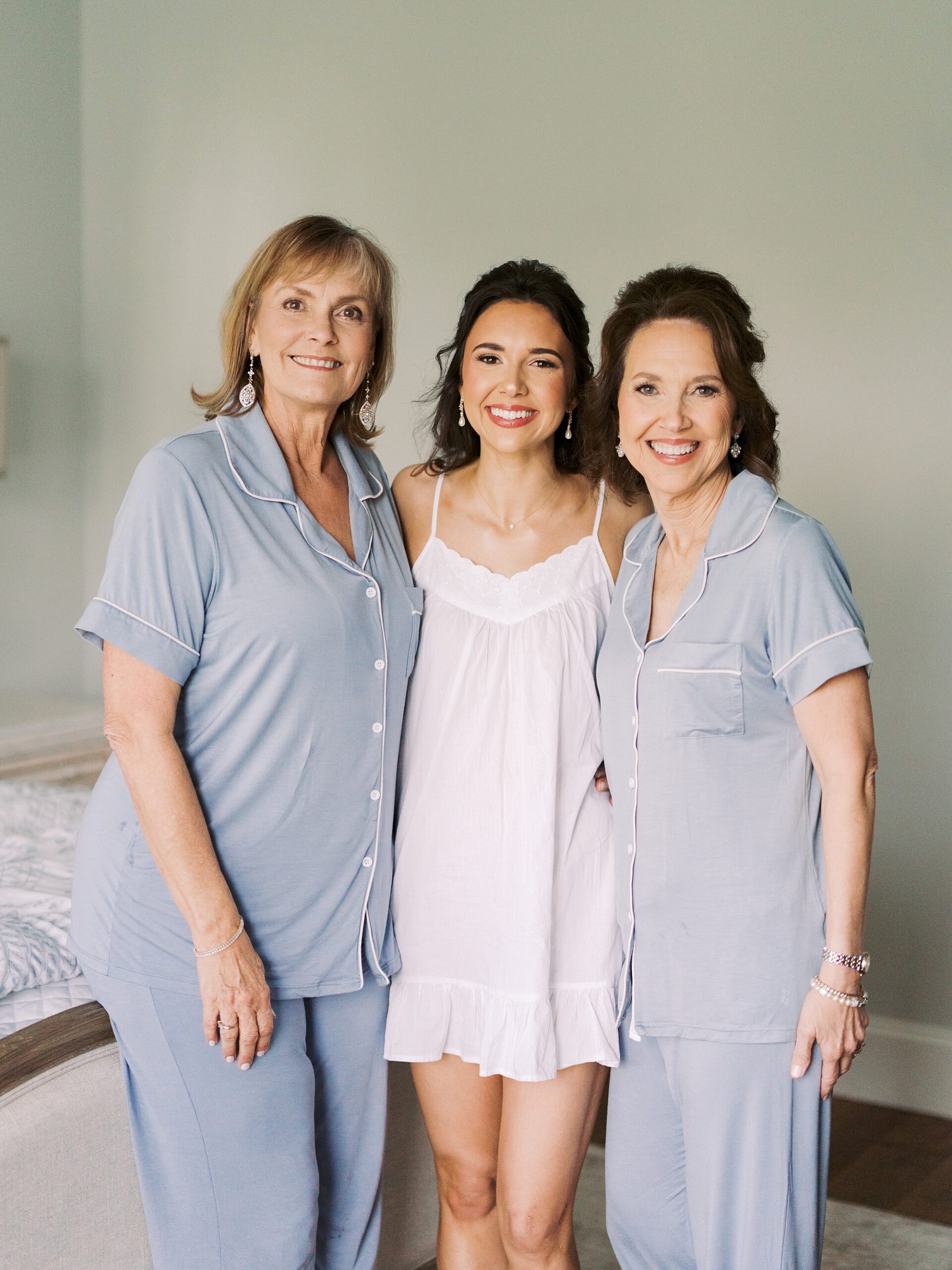 bride poses with mothers during Lafayette LA wedding day