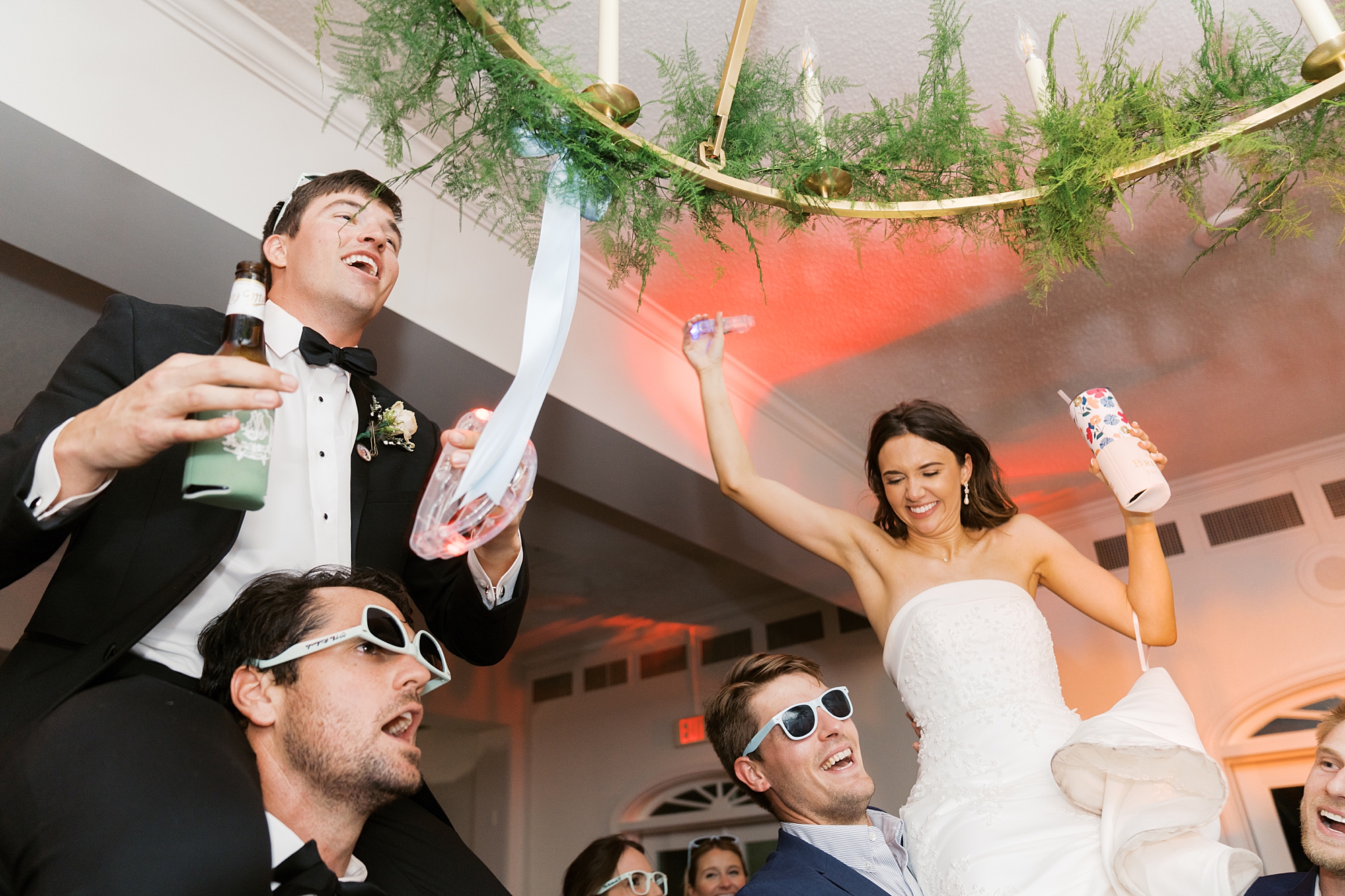 guests dance with live band during Oakbourne Country Club wedding reception 