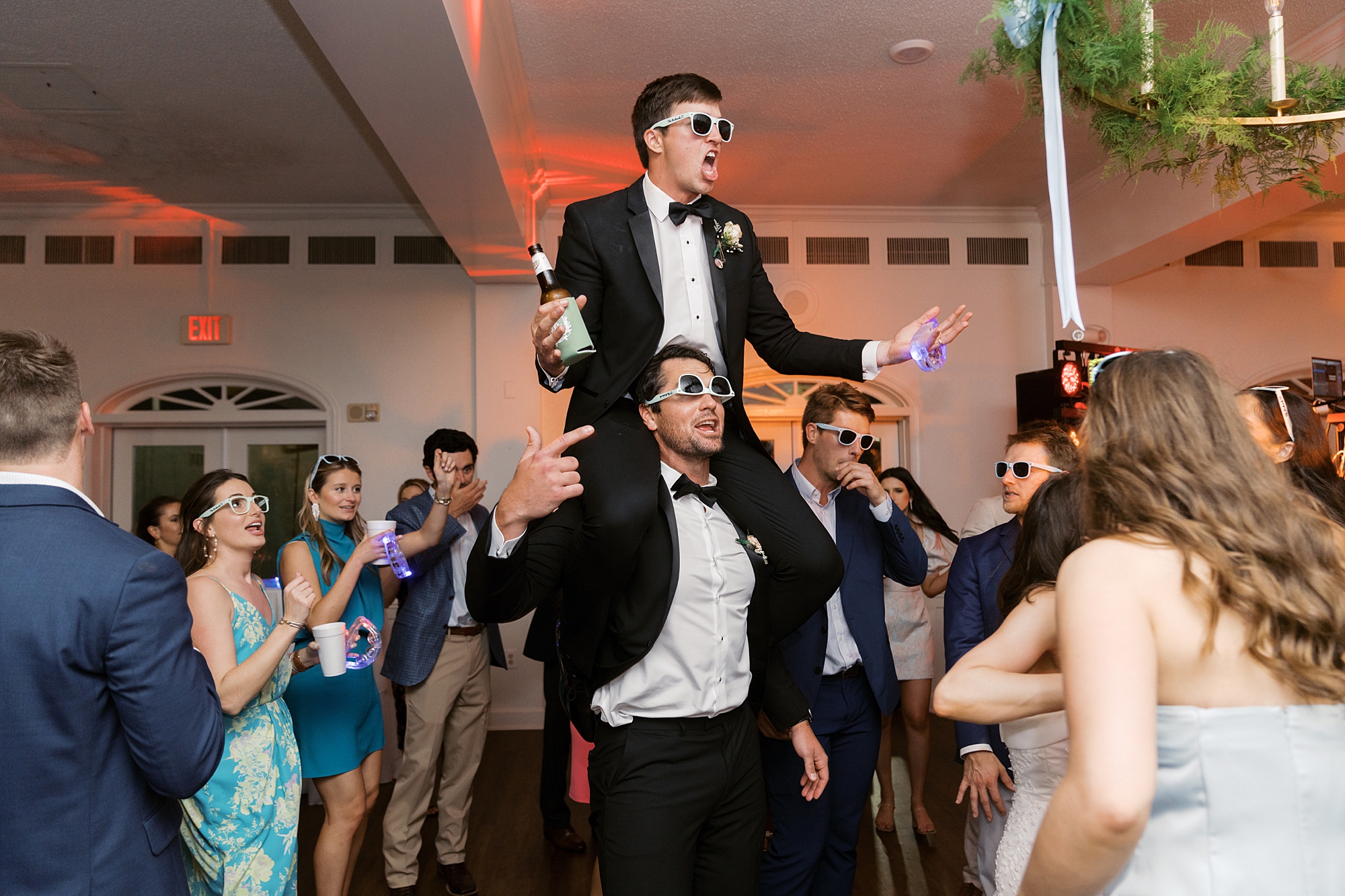guests dance with live band during Oakbourne Country Club wedding reception 