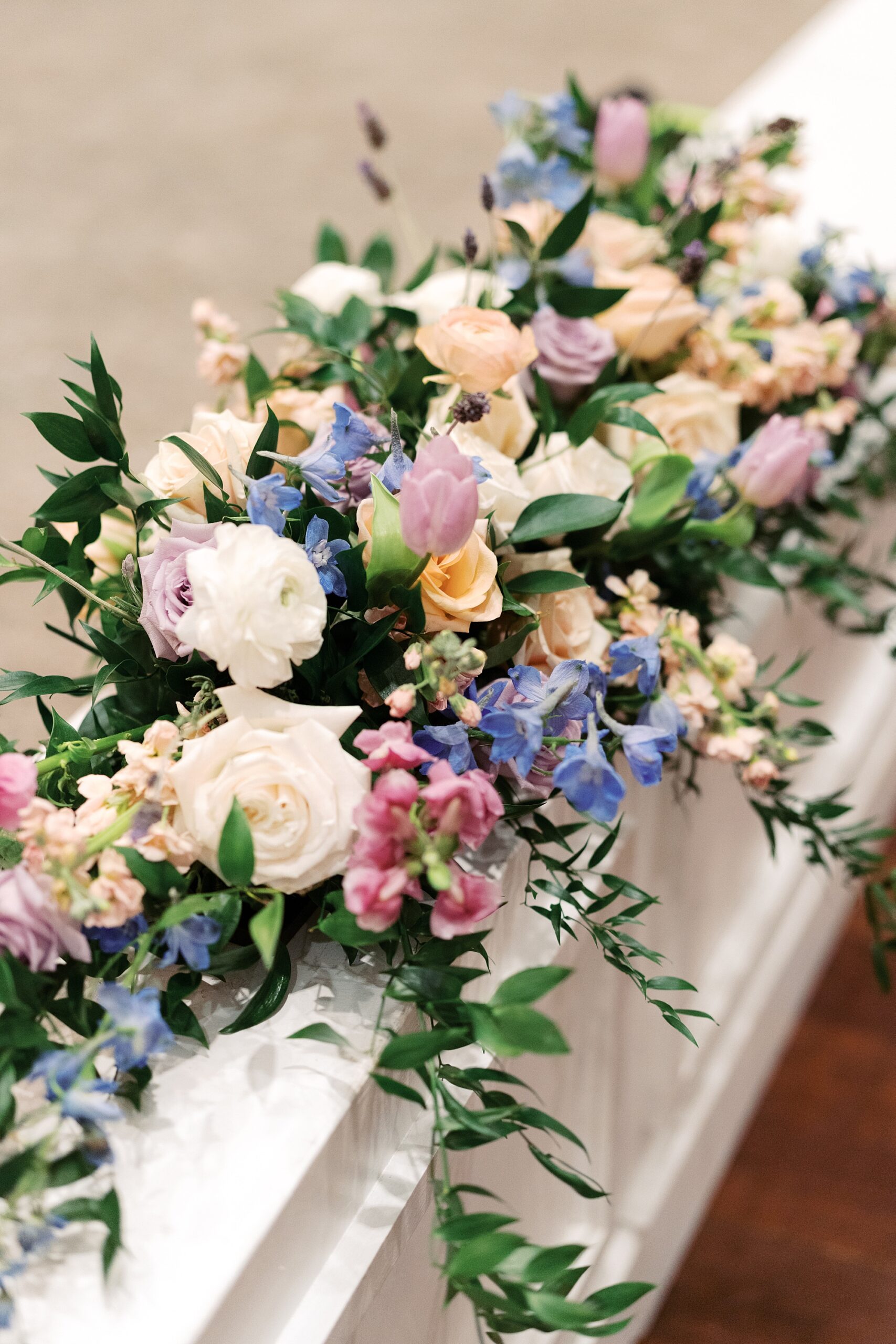 pink, blue, and white flowers for wedding reception at Le Pavillon